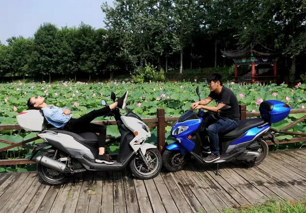 ��Ħ�г�����־���⣺Ǯ�����з�QJ150T-23/125T-23